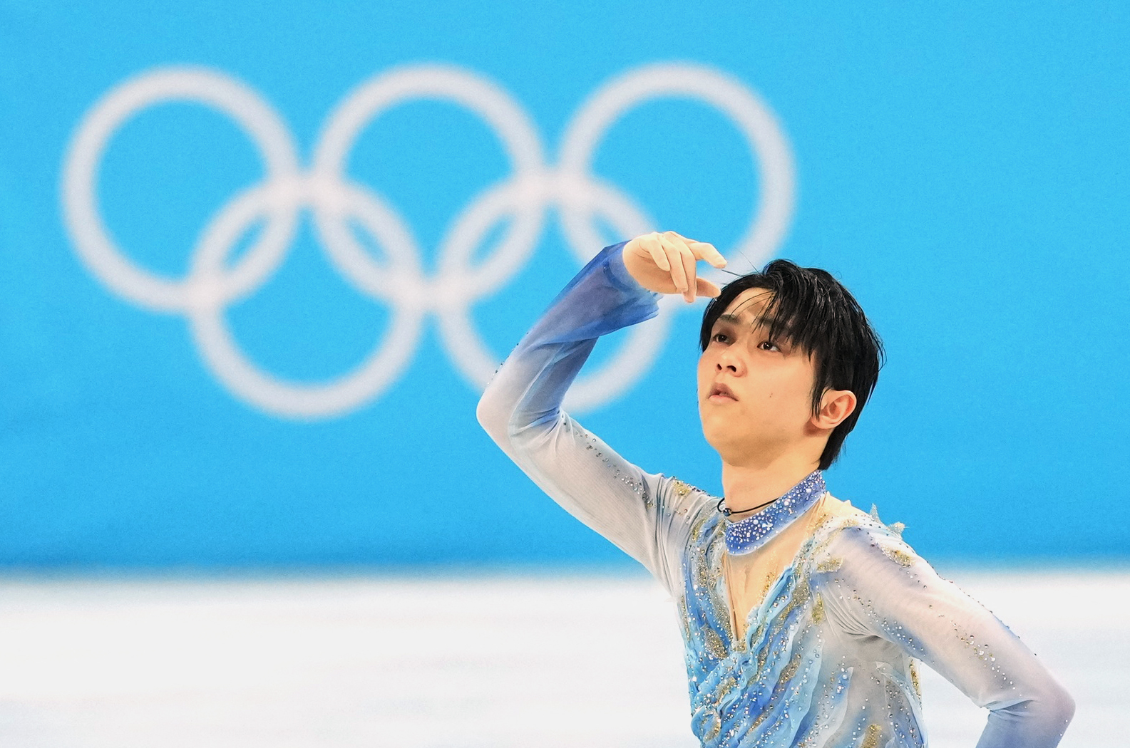  Men Single Skating - Short Program - Capital Indoor Stadium, Beijing, China - February 8, 2022. Yuzuru Hanyu of Japan reacts after his performance.