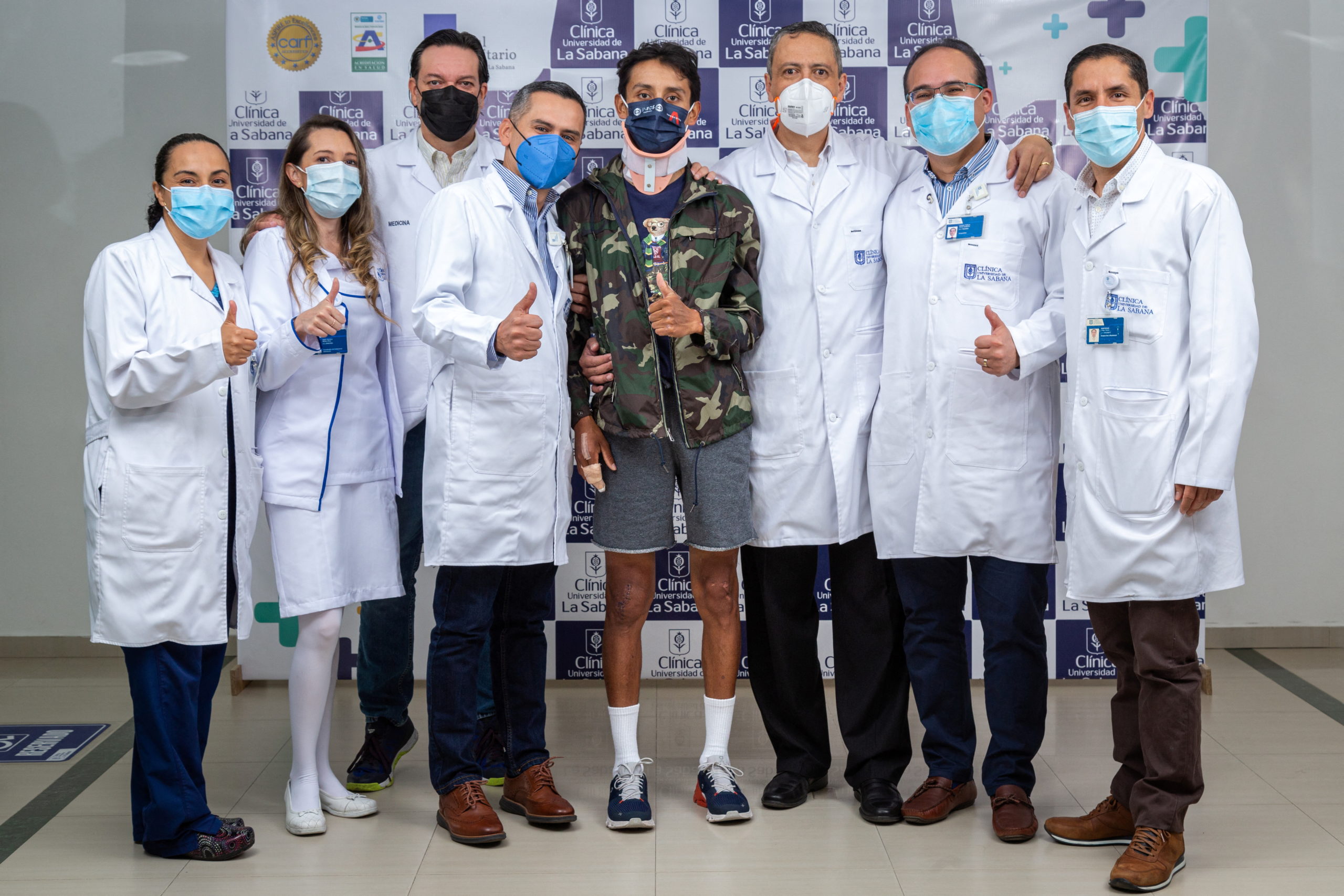 FILE PHOTO: Former Tour de France winner Egan Bernal poses for a photo with the medical team of the Clinica Universidad de la Sabana, after discharging him following several operations to which he was subjected after suffering an accident while training on Colombian roads, in Chia, Colombia February 6, 2022. 