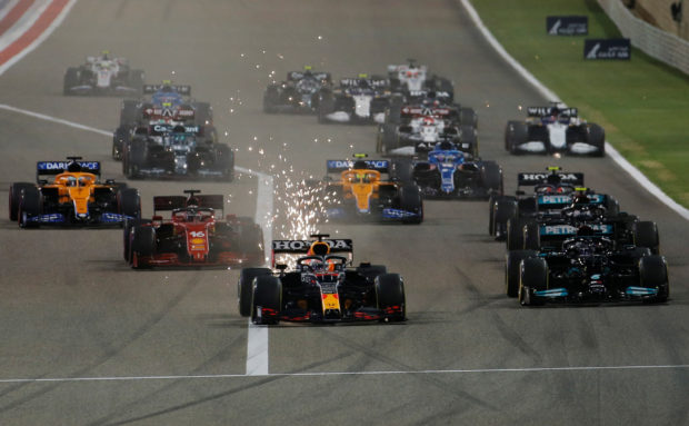 FILE PHOTO: Formula One F1 - Bahrain Grand Prix - Bahrain International Circuit, Sakhir, Bahrain - March 28, 2021 Red Bull's Max Verstappen leads at the start of the race