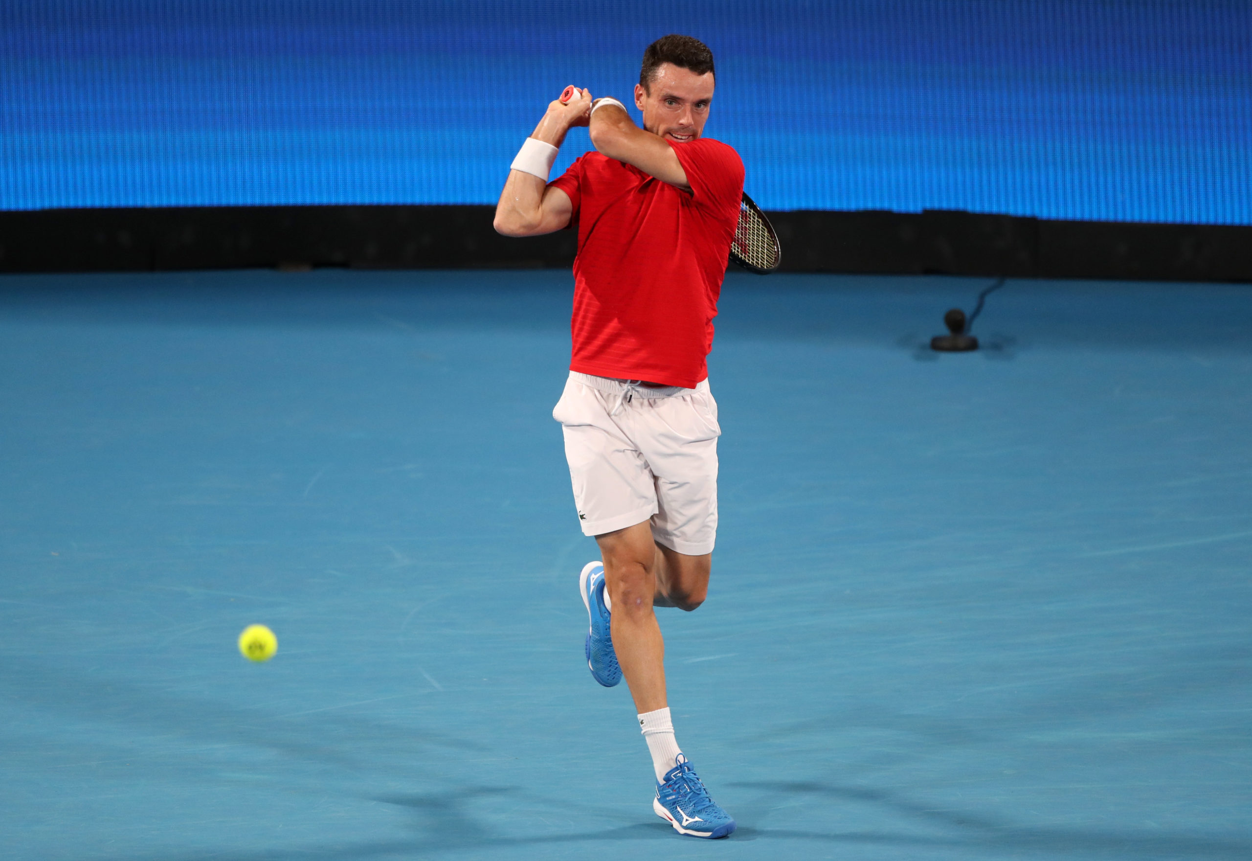 FILE PHOTO: Tennis - ATP Cup - Sydney Olympic Park, Sydney, Australia - January 9, 2022  Spain's Roberto Bautista Agut in action during his final singles match against Canada's Felix Auger-Aliassime 