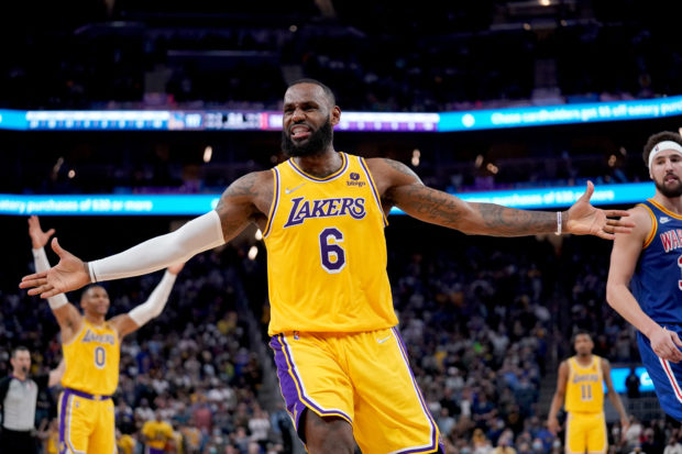 Los Angeles Lakers forward LeBron James (6) reacts after being fouled while shooting a three point shot against the Golden State Warriors in the fourth quarter at the Chase Center. Mandatory Credit: Cary Edmondson-USA TODAY Sports
