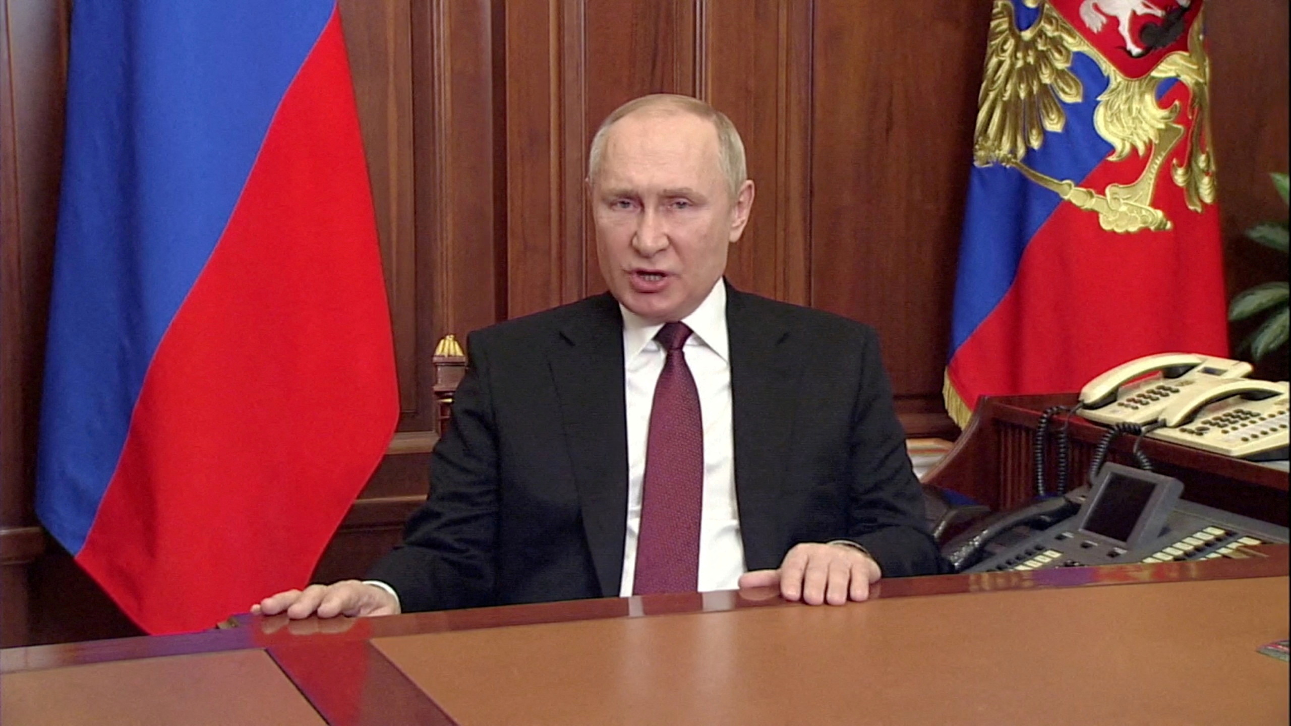 FILE PHOTO: Russian President Vladimir Putin speaks about authorising a special military operation in Ukraine's Donbass region during a special televised address on Russian state TV, in Moscow, Russia, February 24, 2022, in this still image taken from video.  R
