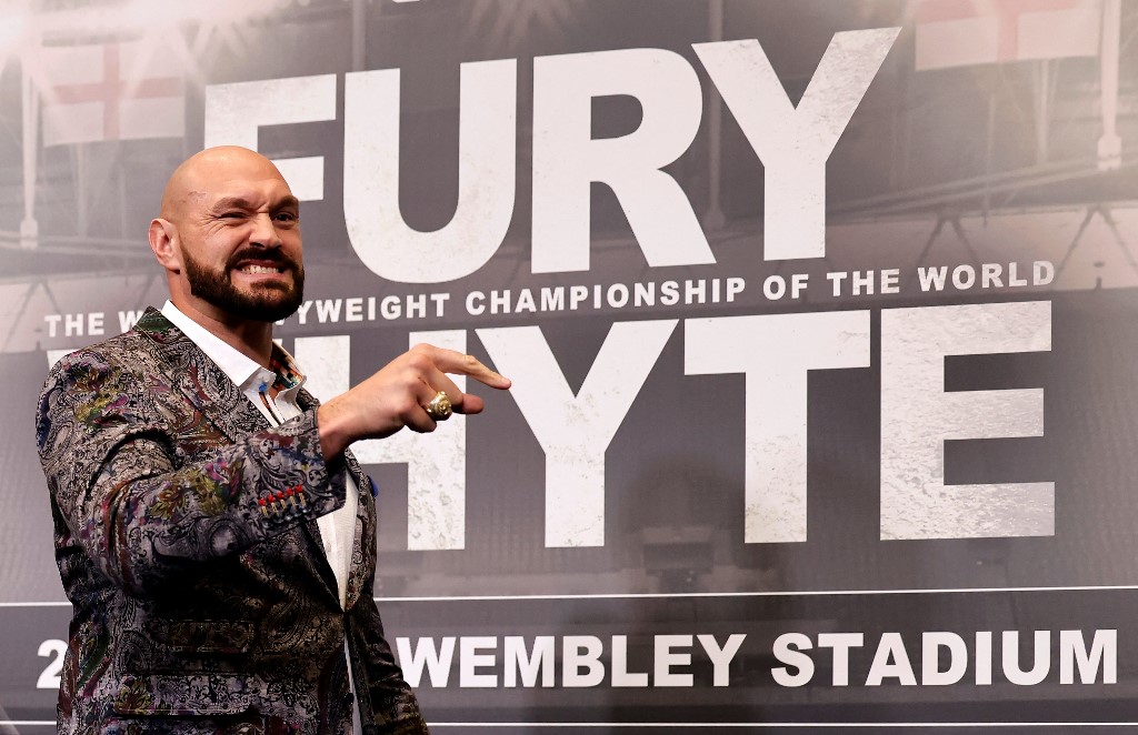 World Boxing Council (WBC) heavyweight title holder Britain's Tyson Fury reacts during a press conference at Wembley Stadium in west London on March 1, 2022. - Tyson Fury is set to have his first bout on home soil in nearly four years when he defends his World Boxing Council (WBC) heavyweight title in an all-British clash against Dillian Whyte at Wembley Stadium on April 23.