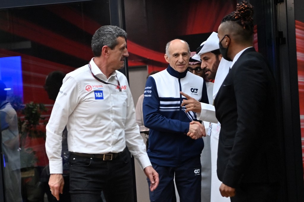 Haas F1 team principal Guenther Steiner (L) and AlphaTauri's team principal Franz Tost (C) speak with President of the International Automobile Federation (FIA) Mohammed Ben Sulayem (2nd-R) as they leave a room following a meeting with other Formula One prinicpals and drivers before the second practice session ahead of the 2022 Saudi Arabia Formula One Grand Prix at the Jeddah Corniche Circuit on March 25, 2022. 