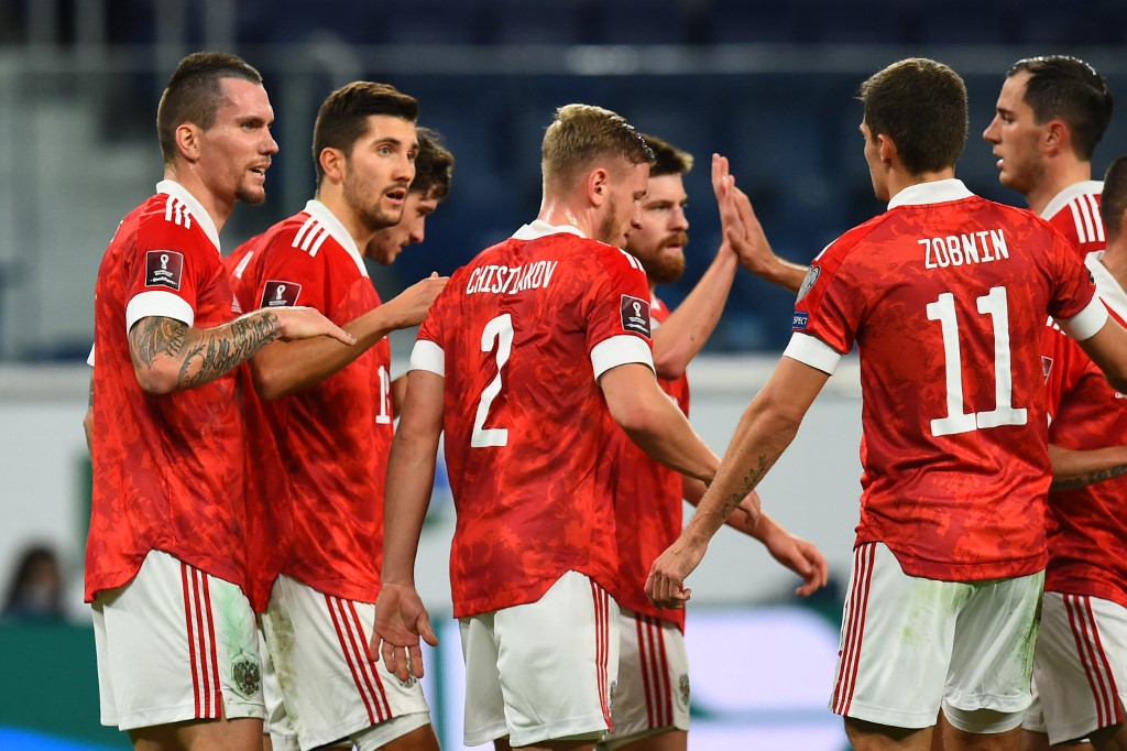 Russia's forward Anton Zabolotny celebrates with teammates after scoring the team's fifth goal during the FIFA World Cup Qatar 2022 qualification football match between Russia and Cyprus in Saint Petersburg on November 11, 2021