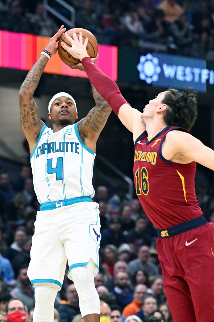 Isaiah Thomas #4 of the Charlotte Hornets shoots over Cedi Osman #16 of the Cleveland Cavaliers during the second quarter at Rocket Mortgage Fieldhouse on March 02, 2022 in Cleveland, Ohio.