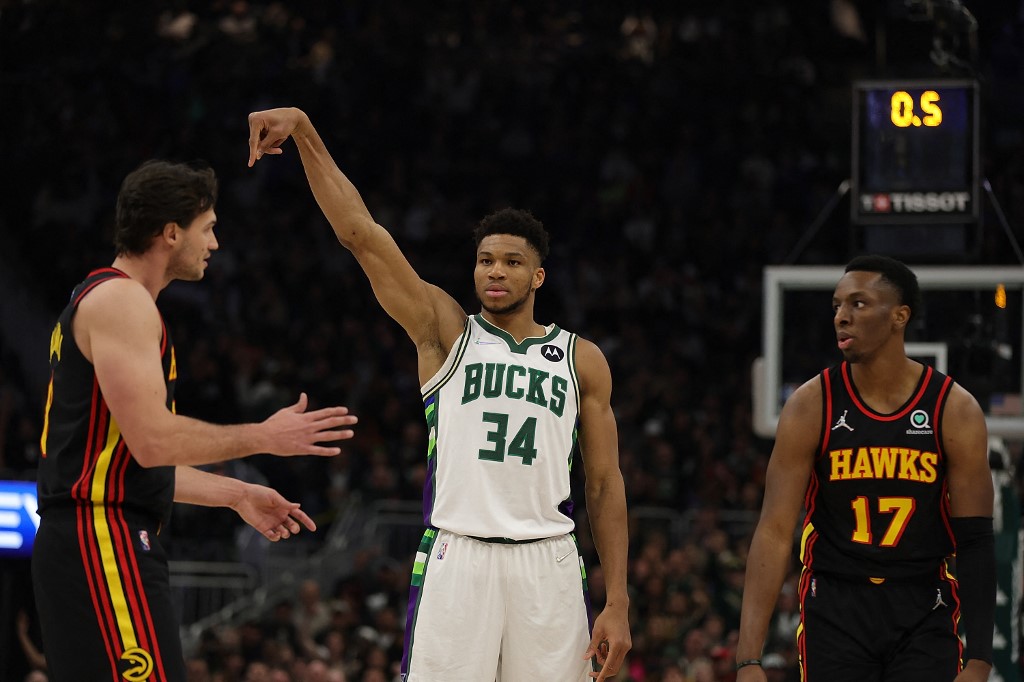 Giannis Antetokounmpo #34 of the Milwaukee Bucks reacts to a three point shot during the first half of a game against the Atlanta Hawks at Fiserv Forum on March 09, 2022 in Milwaukee, Wisconsin. NOTE TO USER: User expressly 