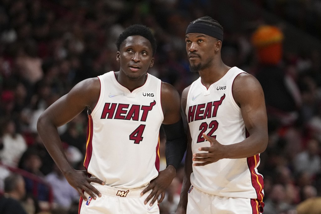 FILE–Jimmy Butler #22 and Victor Oladipo #4 of the Miami Heat 