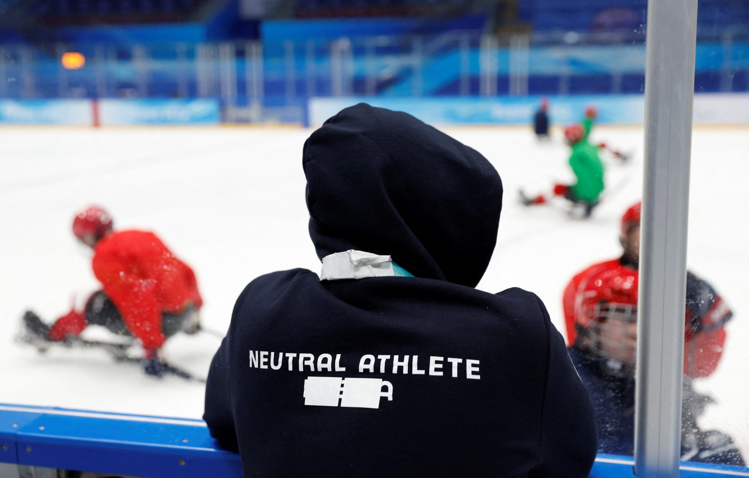 Beijing 2022 Winter Paralympic Games - Para Ice Hockey - Training - National Indoor Stadium, Beijing, China - March 3, 2022. A team member of the team formerly known as the Russian Paralympic Committee displays the words 'neutral athlete' with a piece of tape covering the word Russia on their clothing during training