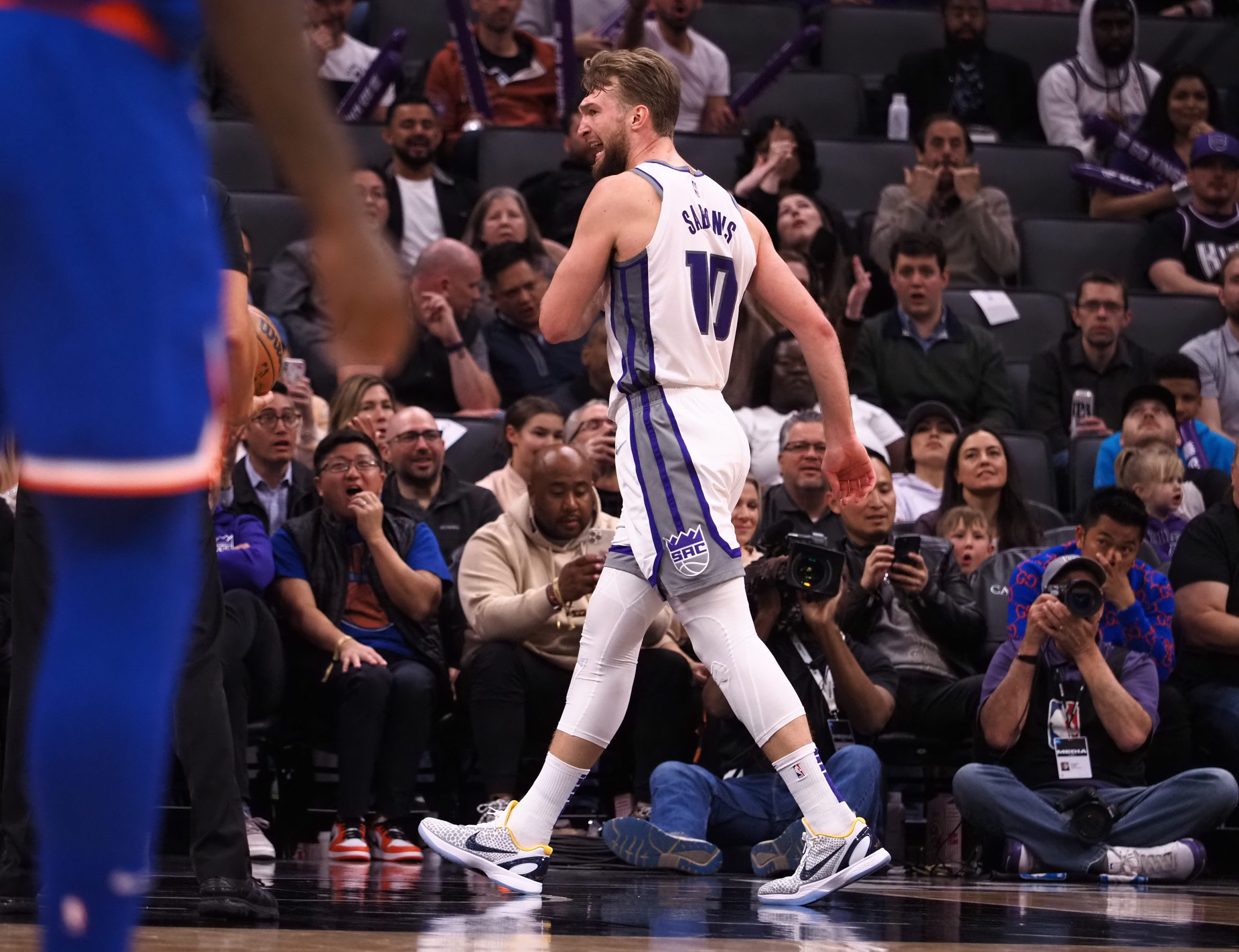 FILE PHOTO: Mar 7, 2022; Sacramento, California, USA; Sacramento Kings center Domantas Sabonis (10) reacts after being called for a foul resulting in a technical during the fourth quarter against the New York Knicks at Golden 1 Center. 