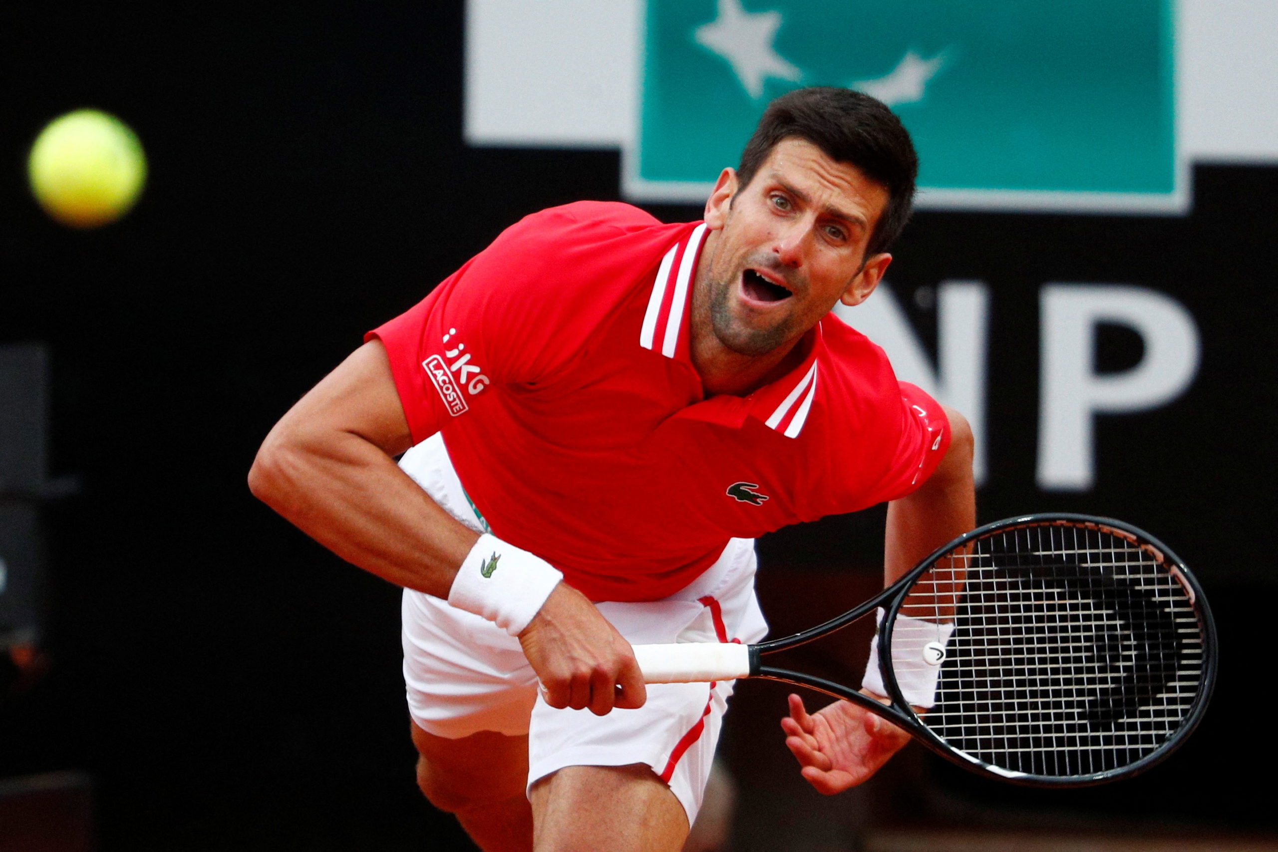 FILE PHOTO: Tennis - ATP Masters 1000 - Italian Open - Foro Italico, Rome, Italy - May 16, 2021 Serbia's Novak Djokovic in action during his final match against Spain's Rafael Nadal 