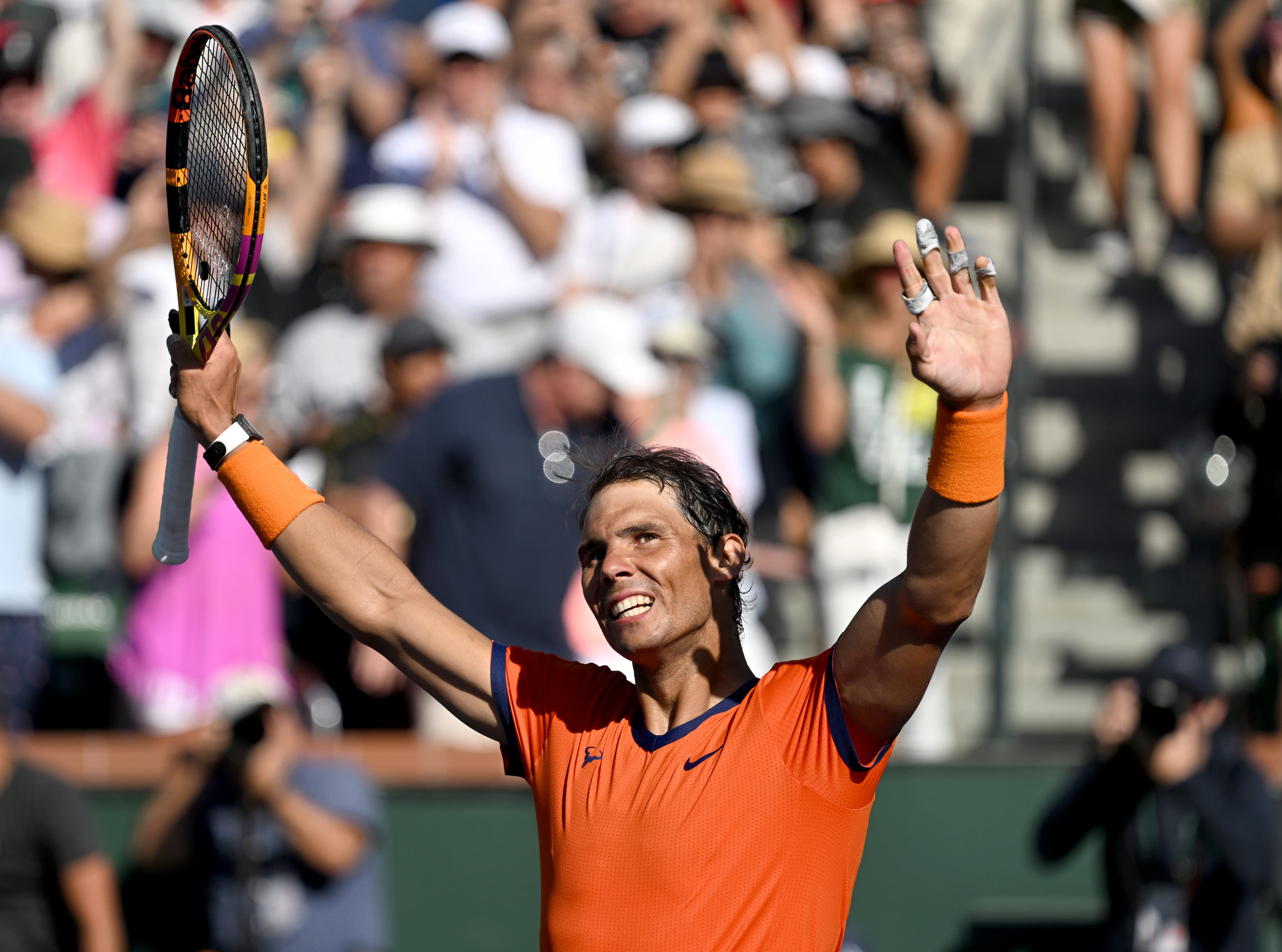 Mar 16, 2022; Indian Wells, CA, USA;  Rafael Nadal (ESP) celebrates after defeating Reilly Opelka (USA) in the fourth round at the BNP Paribas Open at the Indian Wells Tennis Garden. 