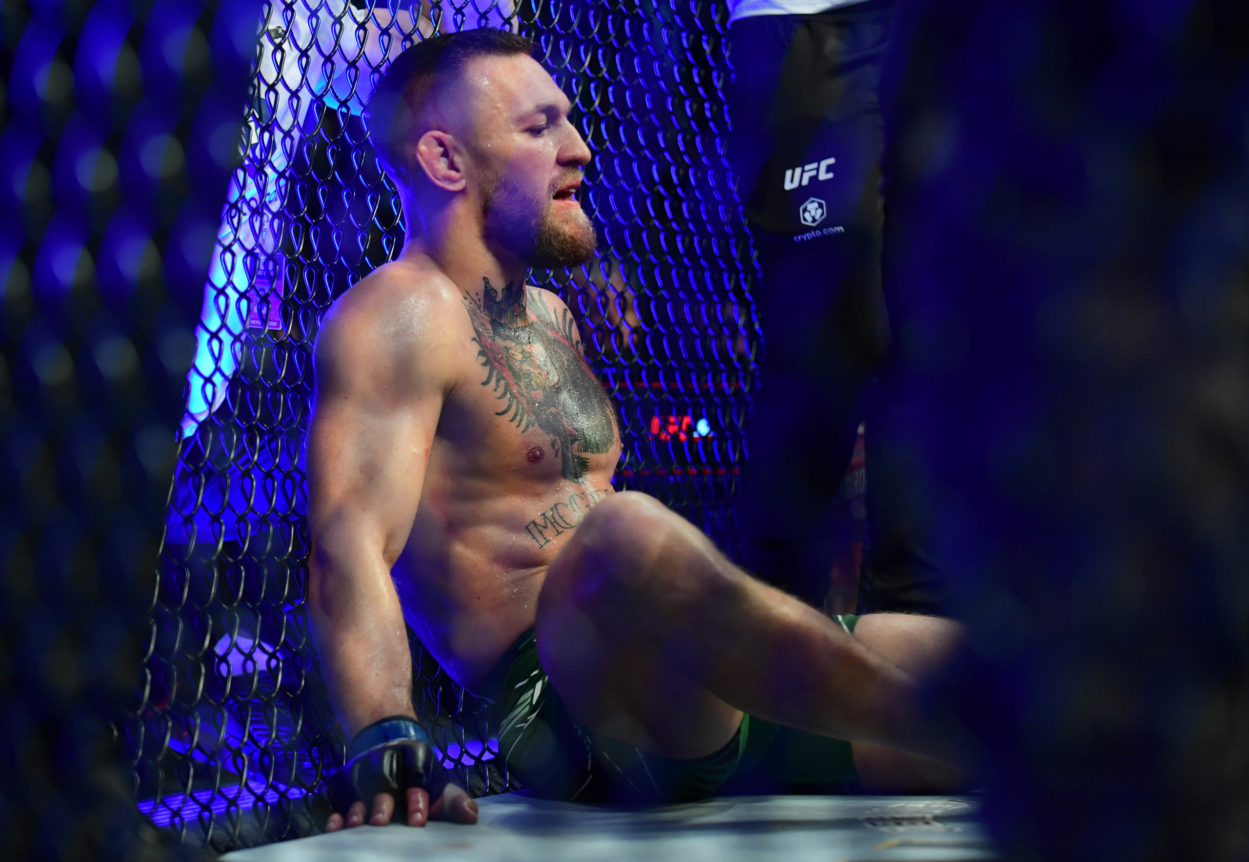 FILE PHOTO: Jul 10, 2021; Las Vegas, Nevada, USA; Conor McGregor reacts following an injury suffered against Dustin Poirier during UFC 264 at T-Mobile Arena. 