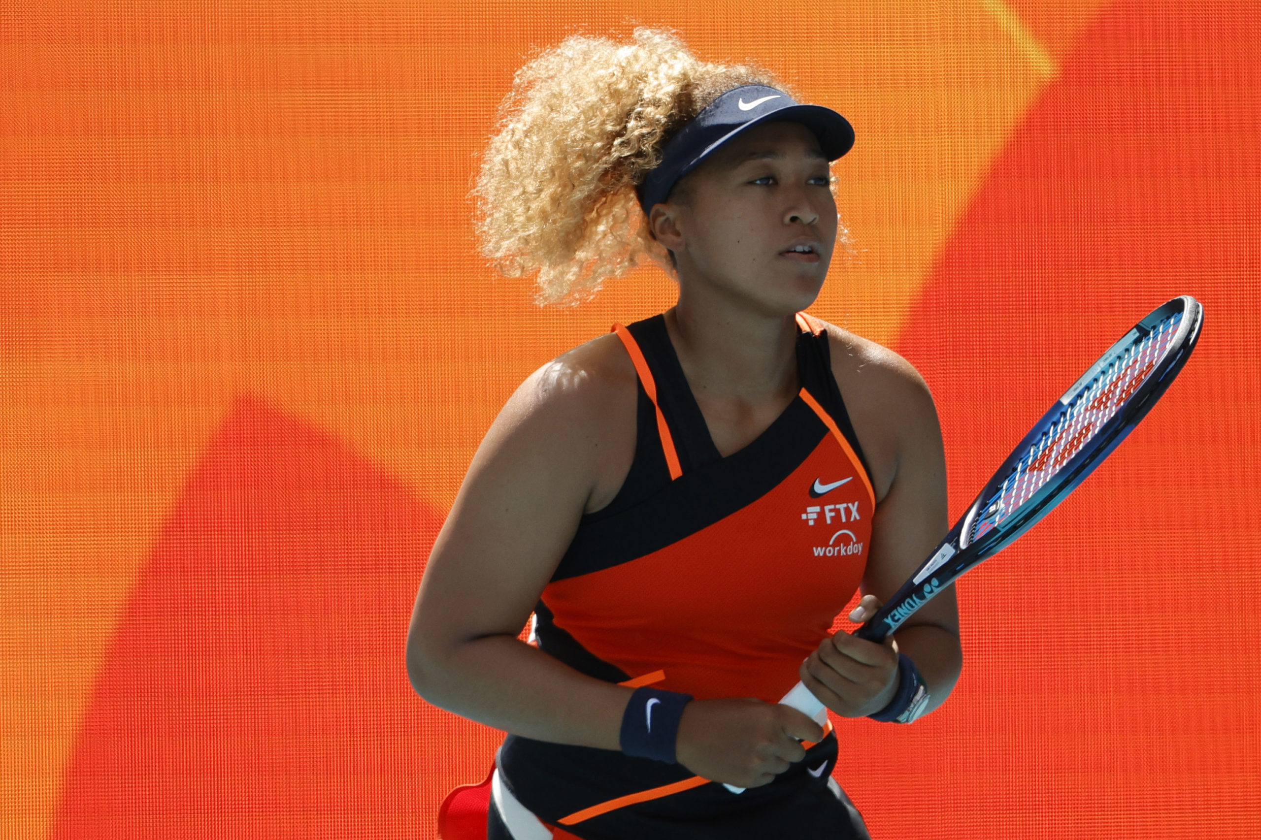 ns, FL, USA; Naomi Osaka (JPN) warms up prior to her match against Astra Sharma (AUS) (not pictured) in a first round women's singles match in the Miami Open at Hard Rock Stadium. 