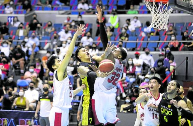 Gaps in the Ginebra defense, as Poy Erram (with the ball) found in this play, is something that coach Tim Cone (pictured right) worries about.  —PHOTOS FROM PBA IMAGES
