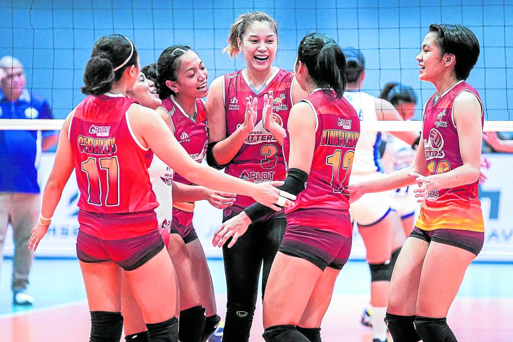 Mika Reyes (center) celebrates with the rest of the High Speed Hitters after sewing up a much-needed first win.