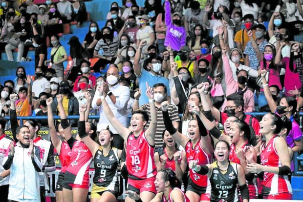 Cignal’s bench whoops it up together with the crowd as fans are allowed back in the stands for the first time. —PVL PHOTO