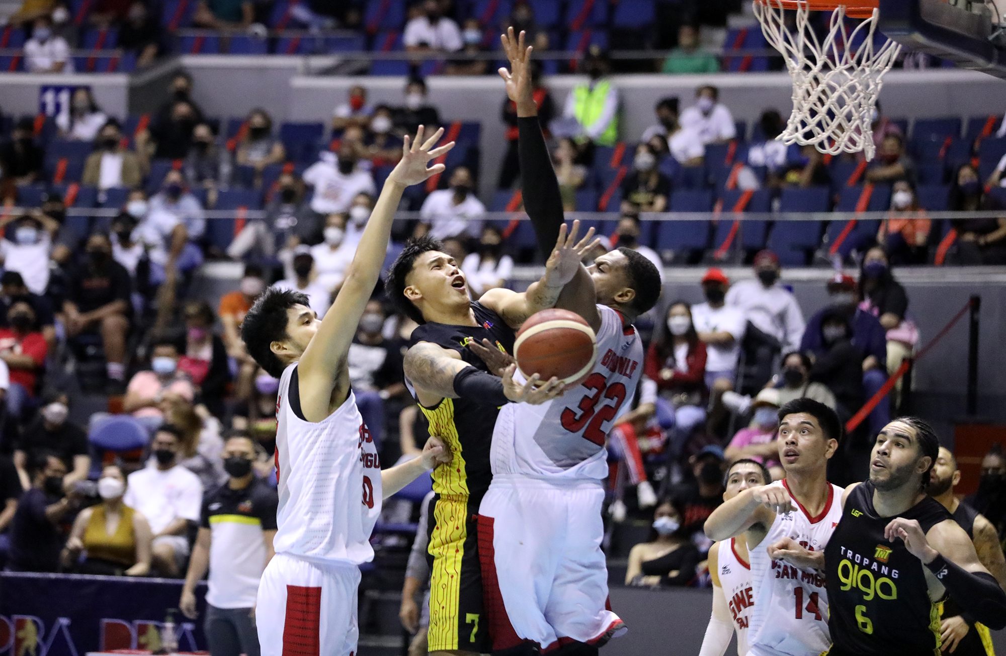 Holes in the Ginebra defense, like what Poy Erram (with ball) finds in this play, is what coach Tim Cone (right photo) is worried about. —PHOTOS FROM PBA IMAGES