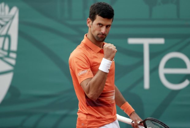 Serbia's Novak Djokovic reacts during his tennis singles match against Serbia’s Miomir Kecmanovic at the Serbia Tennis Open ATP 250 series tournament in Belgrade on April 21, 2022. (