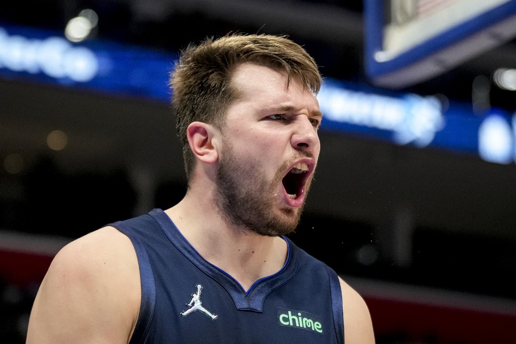 Luka Doncic #77 of the Dallas Mavericks reacts against the Detroit Pistons during the third quarter at Little Caesars Arena on April 06, 2022 in Detroit, Michigan. 