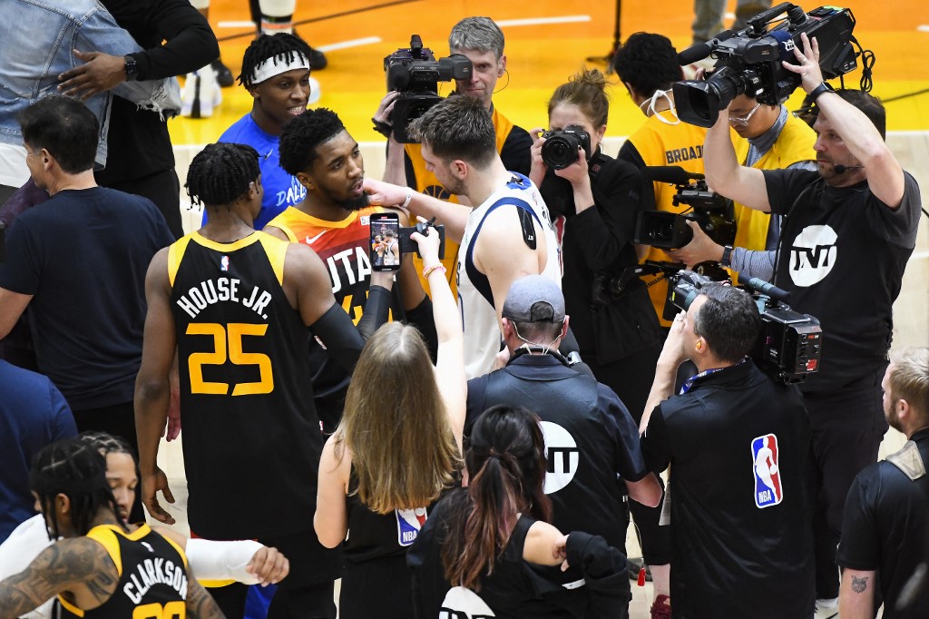 Donovan Mitchell #45 of the Utah Jazz and Luka Doncic #77 of the Dallas Mavericks speak after Game 6 of the Western Conference First Round Playoffs at Vivint Smart Home Arena on April 28, 2022 in Salt Lake City, Utah. NOTE TO USER: 
