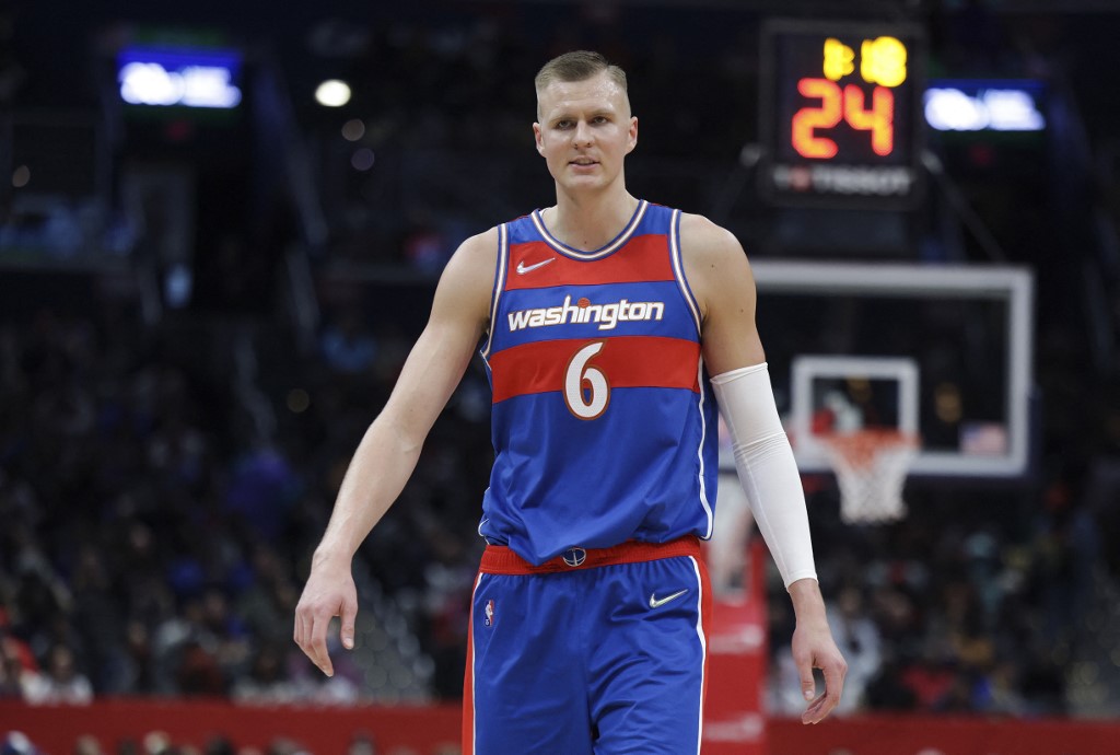 Kristaps Porzingis #6 of the Washington Wizards walks on the court against the Golden State Warriors at the Capital One Arena on March 27, 2022 in Washington, DC. N