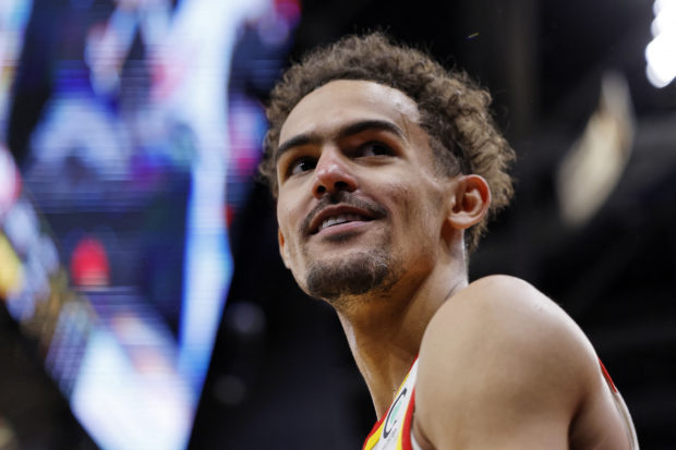 Trae Young #11 of the Atlanta Hawks reacts during the second half against the Cleveland Cavaliers at Rocket Mortgage Fieldhouse on April 15, 2022 in Cleveland, Ohio. NOTE TO USER: User expressly acknowledges and agrees that, by downloading and or using this photograph, User is consenting to the terms and conditions of the Getty Images License Agreement. Rick Osentoski/Getty Images/AFP (Photo by Rick Osentoski / GETTY IMAGES NORTH AMERICA / Getty Images via AFP)