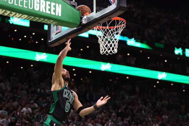 of the Boston Celtics scores the game winning basket against the Brooklyn Nets during the fourty quarter of Round 1 Game 1 of the 2022 NBA Eastern Conference Playoffs at TD Garden on April 17, 2022 in Boston, Massachusetts. The Celtics defeat the Nets 115-114. Maddie Meyer/Getty Images/AFP (Photo by Maddie Meyer / GETTY IMAGES NORTH AMERICA / Getty Images via AFP)