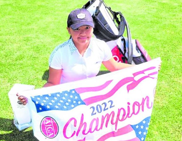 Rianne Malixi displays the championship banner after winning the Thunderbird Junior All-Star in a three-hole playoff. —CONTRIBUTED PHOTO