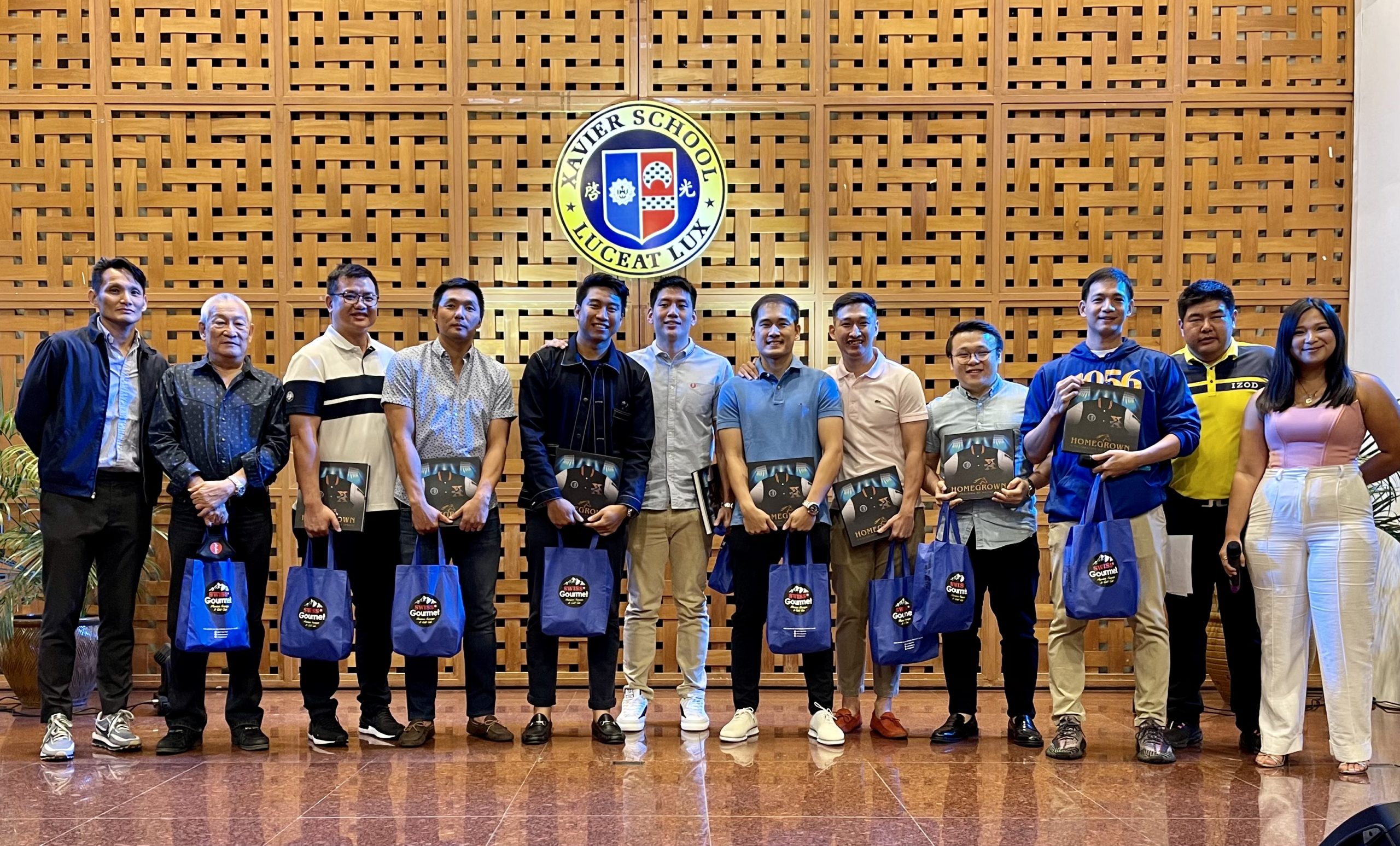 Xavier School alumni featured in the book launch of “Homegrown: A Celebration of Xavier Sports” last Monday, April 4 at the Angelo King Center inside Xavier School in San Juan.  Pictured are Jean Alabanza, Jerry Ngo, Eric Yao, Joseph Yeo, Jett Manuel, Jeron Teng, Kyles Lao, Jarrell Lim, Patrick Syquiatco, Chris Tiu, Xavier Alumni Association, Sports Vice President Oliver Gan, and co-host Eilien Shi.