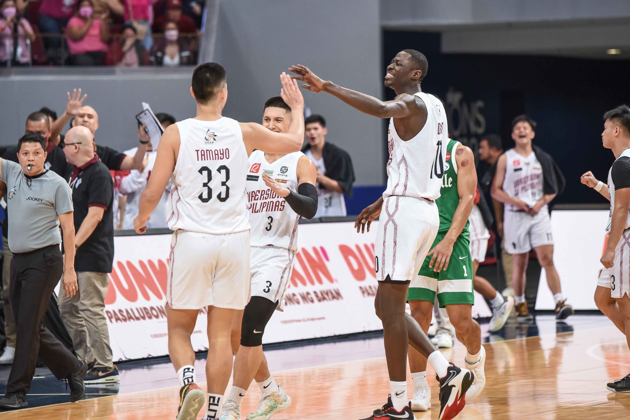 UP's Carl Tamayo and Maodo Diouf celebrate. UAAP PHOTO