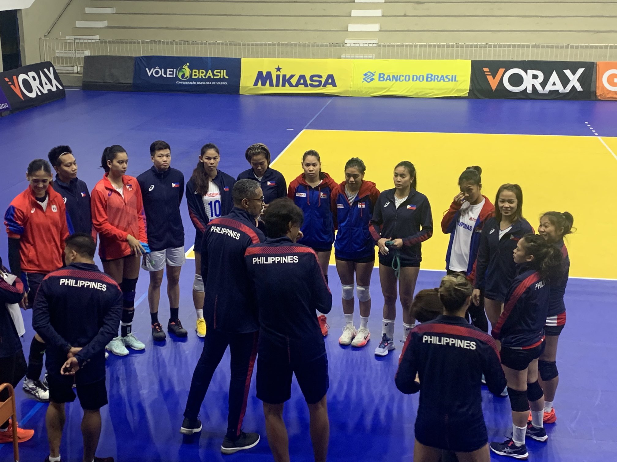 PH women’s head coach Jorge Edson Souza de Brito talks to the team before a tune-up game.