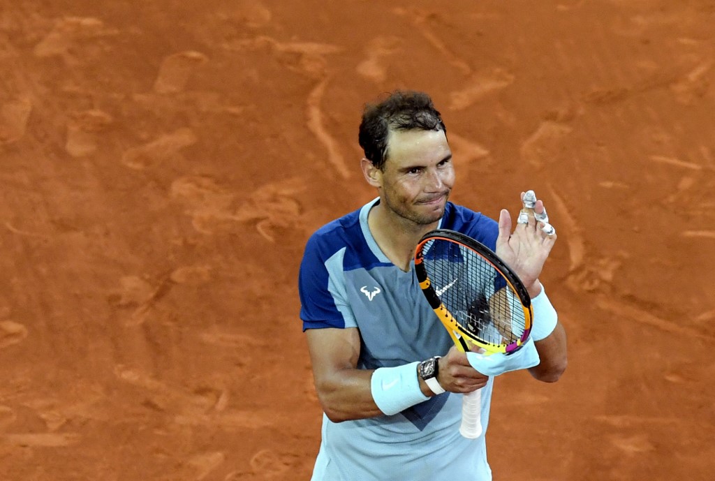 Spain's Rafael Nadal celebrates beating Serbia's Miomir Kecmanovic during their 2022 ATP Tour Madrid Open tennis tournament singles match at the Caja Magica in Madrid on May 4, 2022.