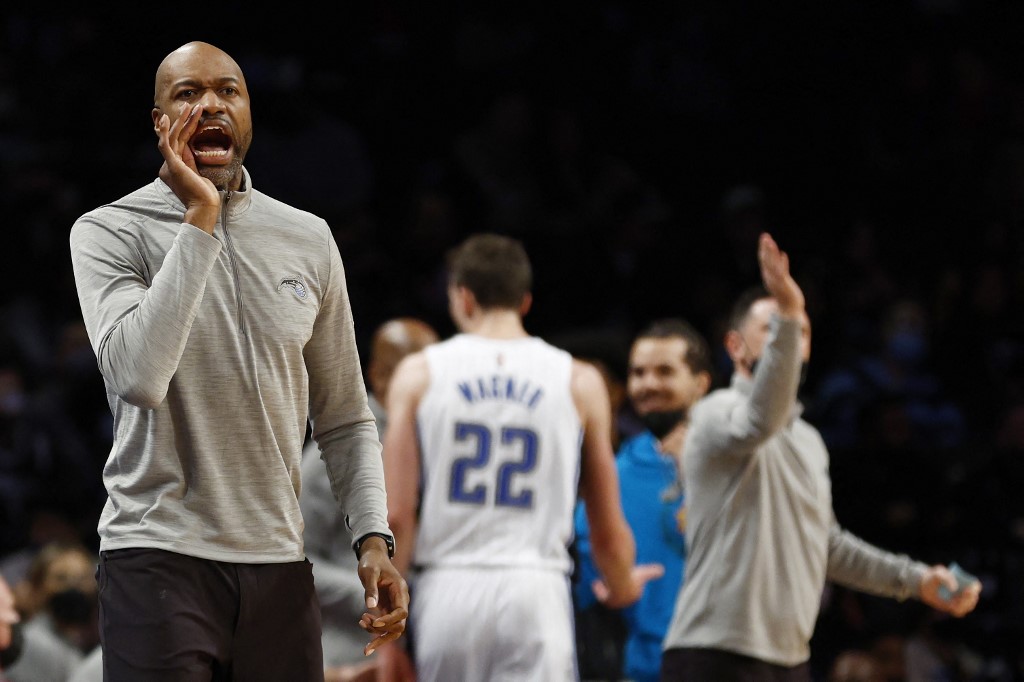  Head coach Jamahl Mosley of the Orlando Magic reacts during the first half against the Brooklyn Nets at Barclays Center on December 18, 2021 in the Brooklyn borough of New York City. NOTE TO USER: 