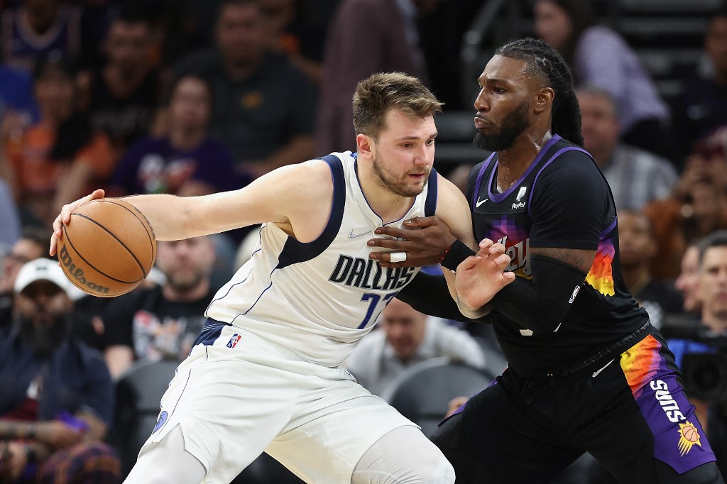 Luka Doncic #77 of the Dallas Mavericks handles the ball against Jae Crowder #99 of the Phoenix Suns during the second half of Game One of the Western Conference Second Round NBA Playoffs at Footprint Center on May 02, 2022 in Phoenix, Arizona. The Suns 