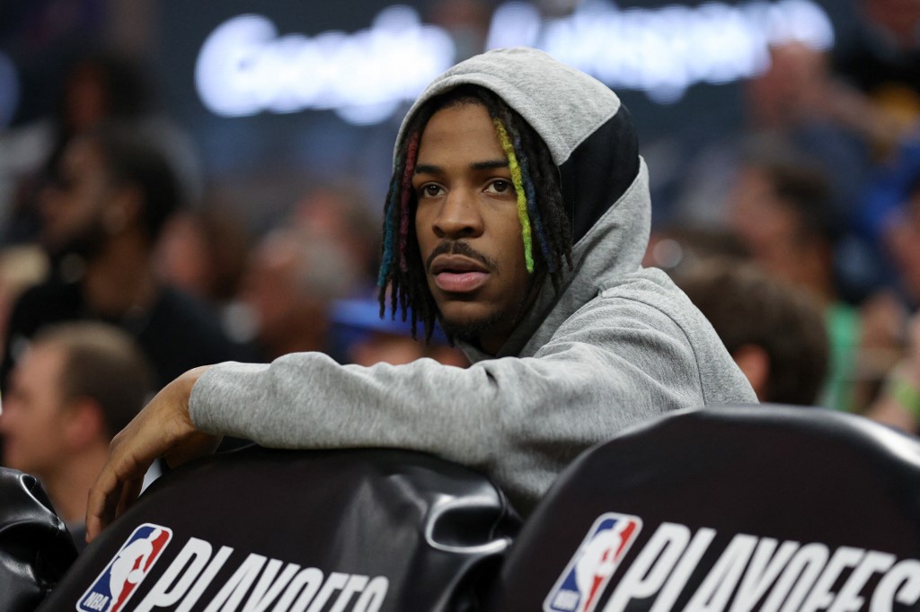 Injured Ja Morant #12 of the Memphis Grizzlies sits on the bench during the first half of Game Four of the Western Conference Semifinals tate Warriors of the NBA Playoffs at Chase Center on May 09, 2022 in San Francisco, California. 
