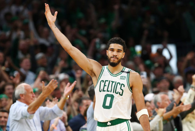 Jayson Tatum #0 of the Boston Celtics gestures during the fourth quarter in Game Seven of the 2022 NBA Playoffs Eastern Conference Semifinals against the Milwaukee Bucks at TD Garden on May 15, 2022 in Boston, Massachusetts. NOTE TO USER: User expressly acknowledges and agrees that, by downloading and/or using this photograph, User is consenting to the terms and conditions of the Getty Images License Agreement.   Adam Glanzman/Getty Images/AFP (Photo by Adam Glanzman / GETTY IMAGES NORTH AMERICA / Getty Images via AFP)