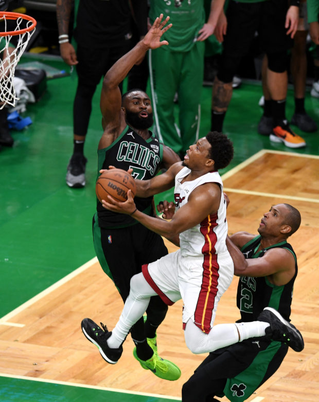  Miami Heat shoots against Jaylen Brown #7 and Al Horford #42 of the Boston Celtics during the second half in Game Six of the 2022 NBA Playoffs Eastern Conference Finals at TD Garden on May 27, 2022 in Boston, Massachusetts. NOTE TO USER: User expressly acknowledges and agrees that, by downloading and/or using this photograph, User is consenting to the terms and conditions of the Getty Images License Agreement.   Kathryn Riley/Getty Images/AFP (Photo by Kathryn Riley / GETTY IMAGES NORTH AMERICA / Getty Images via AFP)