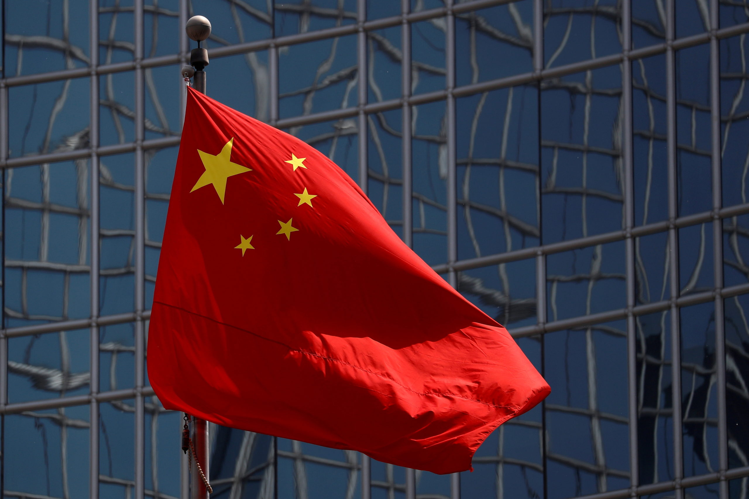 FILE PHOTO: The Chinese national flag is seen in Beijing, China April 29, 2020. 