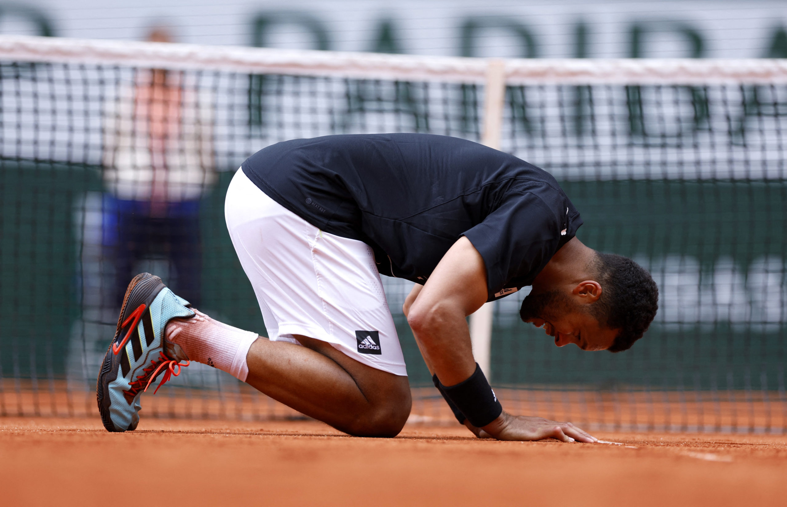 Tennis - French Open - Roland Garros, Paris, France - May 24, 2022 France's Jo-Wilfried Tsonga reacts after playing his final match before retiring, after losing his first round match against Norway's Casper Ruud REUTERS/Gonzalo Fuentes