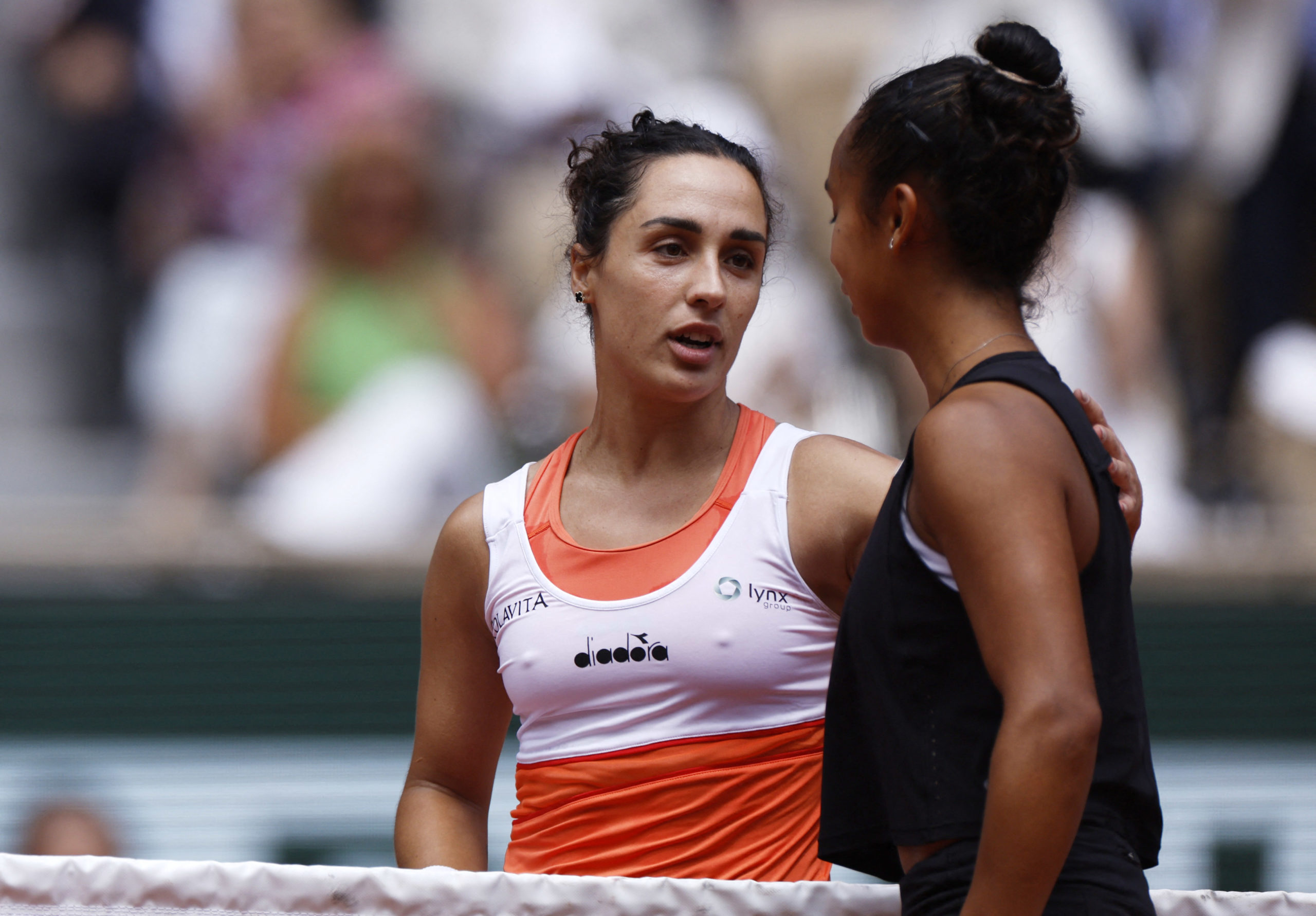 Tennis - French Open - Roland Garros, Paris, France - May 31, 2022  Italy's Martina Trevisan and Canada's Leylah Annie Fernandez after their quarter final match REUTERS/Gonzalo Fuentes