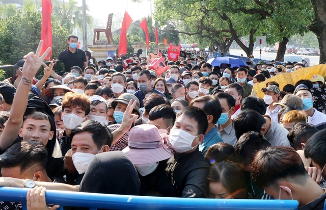 Thousands of people at Viet Tri Stadium to buy men's football tickets. — VNA/VNS Photo via ANN