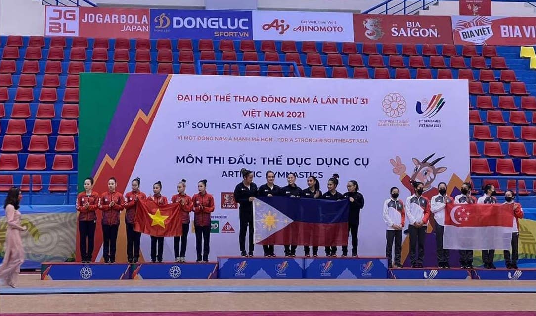 The Philippine women's gymnastics team at the podium for their gold medal finish in the team event. Gymnastics Association of the Philippines photo