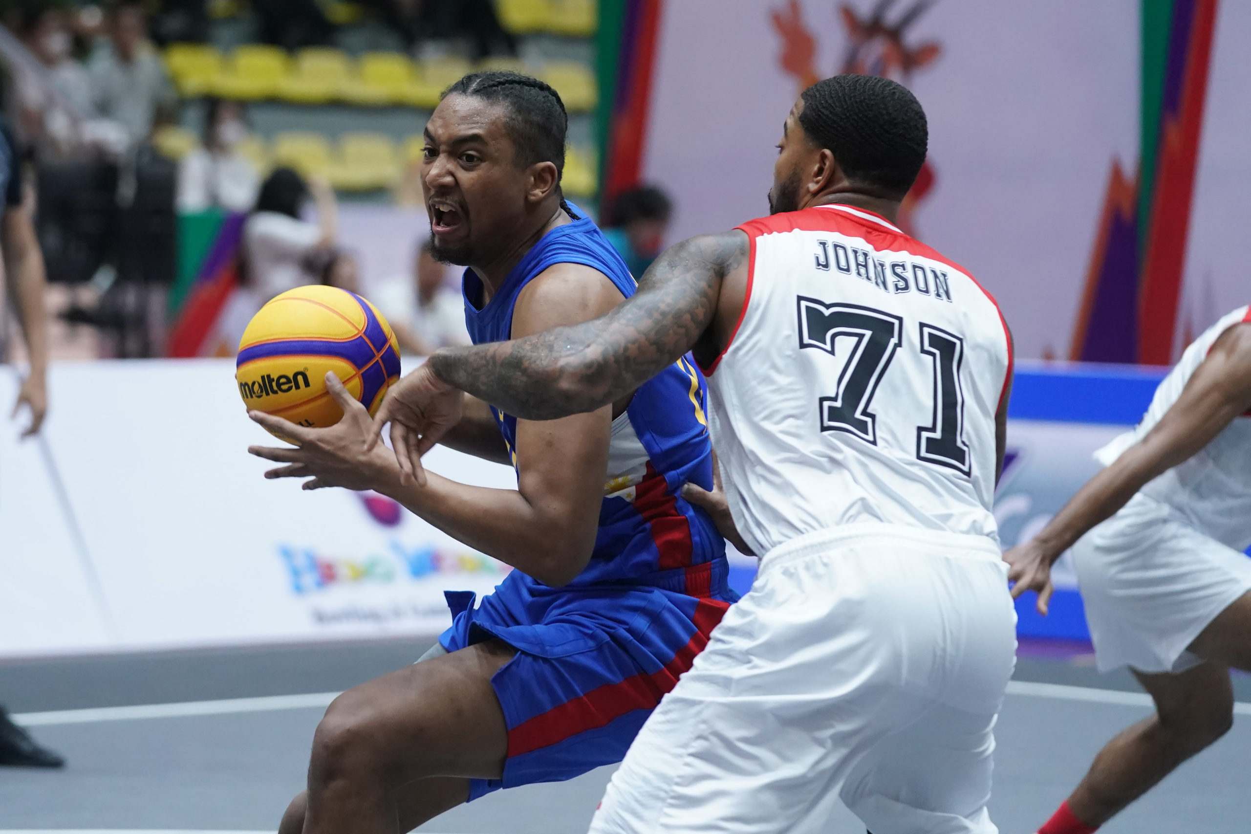 Brandon Ganuelas-Rosser (left) in action during the men’s 3x3 basketball event of the SEA Games.
