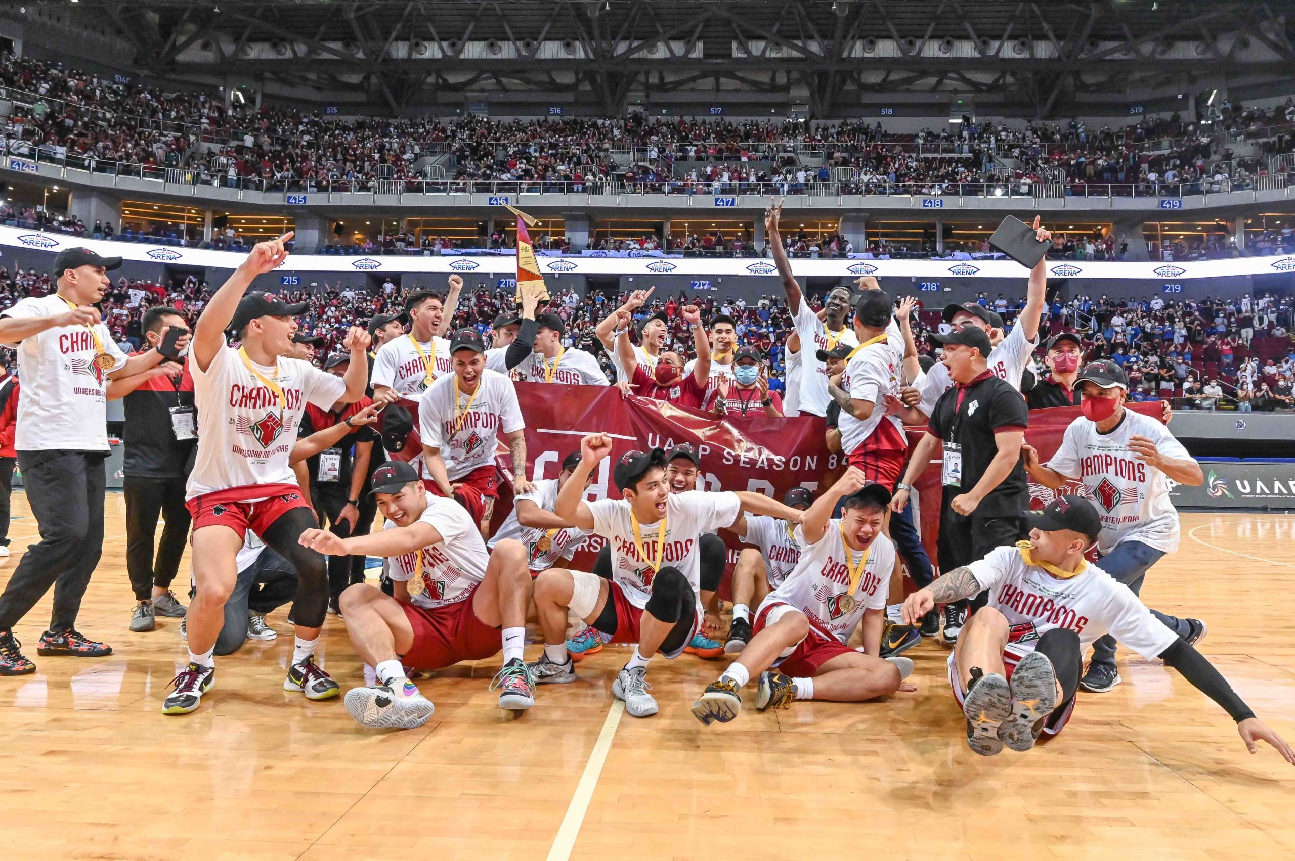 The UP Maroons rush to center court to frame their moment of triumph for posterity. —PHOTOS COURTESY OF UAAP MEDIA