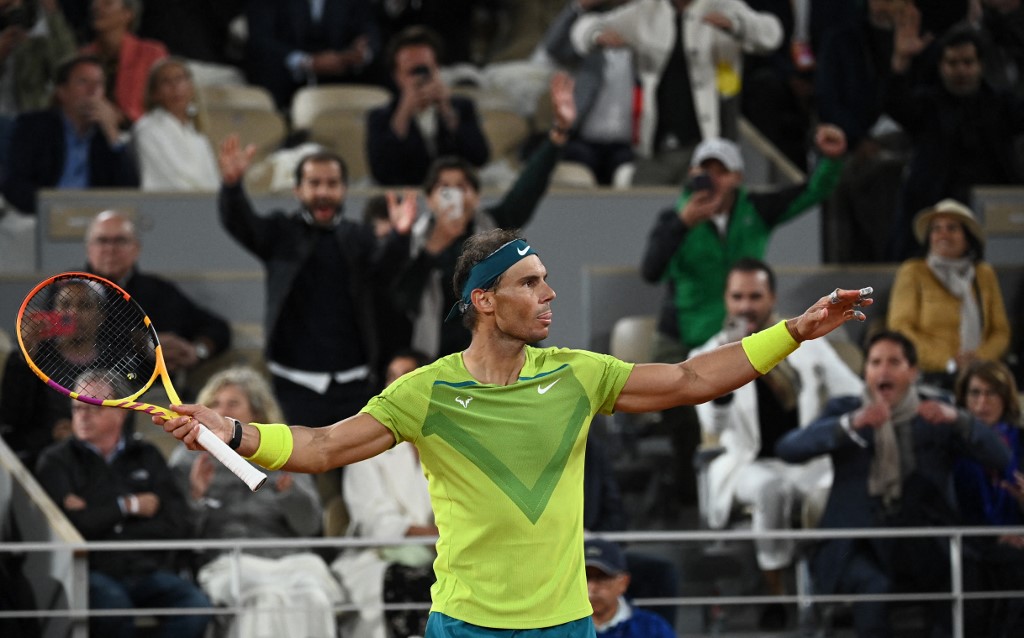 Spain's Rafael Nadal reacts after winning against Serbia's Novak Djokovic at the end of their men's singles match on day ten of the Roland-Garros Open tennis tournament at the Court Philippe-Chatrier in Paris early June 1, 2022. (Photo by Anne-Christine POUJOULAT / AFP)