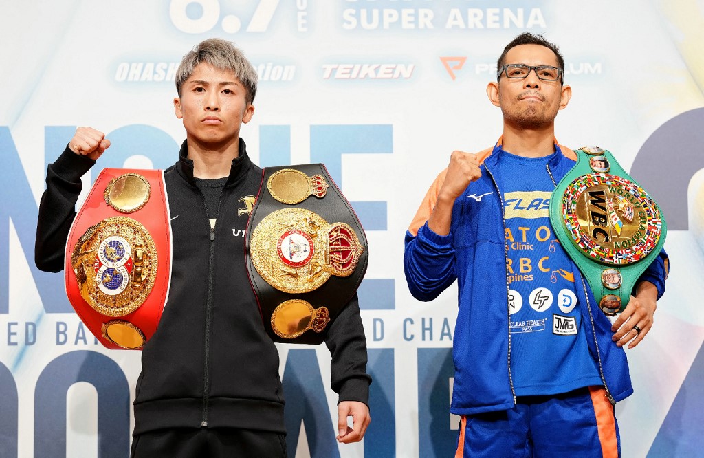 IBF and WBA bantamweight boxing champion Naoya Inoue of Japan (L) and WBC champion Nonito Donaire of Philippines (R) pose during a press event in Yokohama, Kanagawa prefecture on June 3, 2022. - Donaire said on June 3, 2022 there was "a fire burning inside" him as he prepares to face Naoya Inoue next week in a hotly anticipated sequel to their 2019 boxing classic. (Photo by JAPAN POOL / JIJI PRESS / AFP) / Japan OUT
