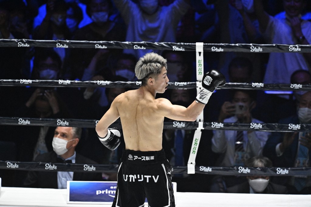 Japan's Naoya Inoue celebrates after winning against Philippines' Nonito Donaire during their Bantamweight unification boxing match at Saitama Super Arena in Saitama on June 7, 2022. (Photo by Philip FONG / AFP)