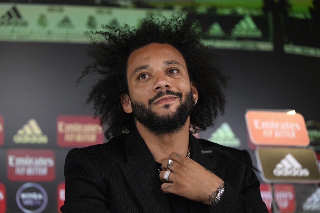Real Madrid defender Marcelo speaks during a press conference during a farewell event at the Ciudad Real Madrid sports facility in Valdebebas, a suburb of Madrid, on June 13, 2022. - Marcelo said his full goodbye emotional with Real Madrid today as the most decorated player in the club's history but insists he has no plans to retire.  Marcelo has won 25 trophies at Real Madrid, including 5 Champions League, 6 La Liga and 2 Copa del Rey.  (Photo by Pierre-Philippe MARCOU/AFP)