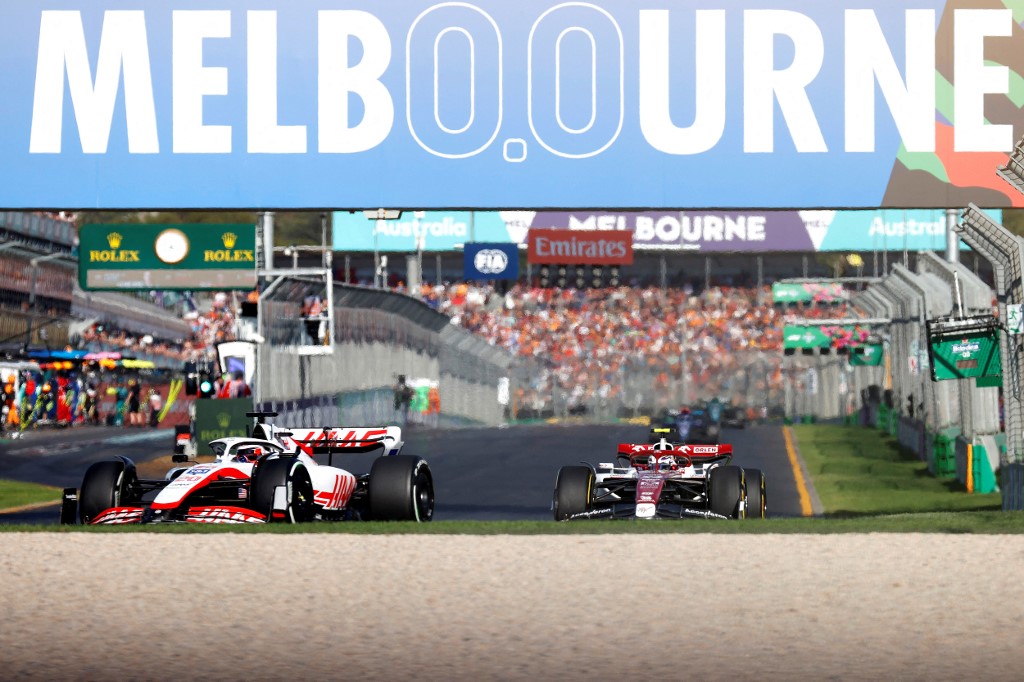 (FILES) In this file photo taken on April 10, 2022 Haas' Danish driver Kevin Magnussen leads a pack of cars during the 2022 Formula One Australian Grand Prix at the Albert Park Circuit in Melbourne. - The Australian Grand Prix will continue to be held in Melbourne until 2035 after race organisers announced a new 10-year agreement with Formula One on June 16, 2022, beating off rival bids from Sydney and the Gold Coast. (Photo by Con Chronis / AFP) / -- IMAGE RESTRICTED TO EDITORIAL USE - STRICTLY NO COMMERCIAL USE --